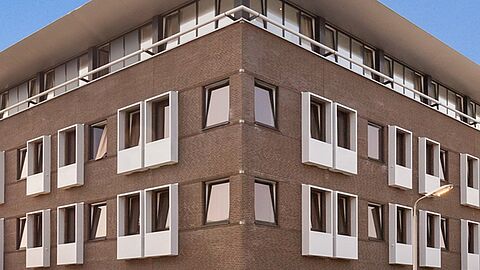 Impressie hoe het gebouw eruit komt te zien; een gebouw van 5 verdiepingen